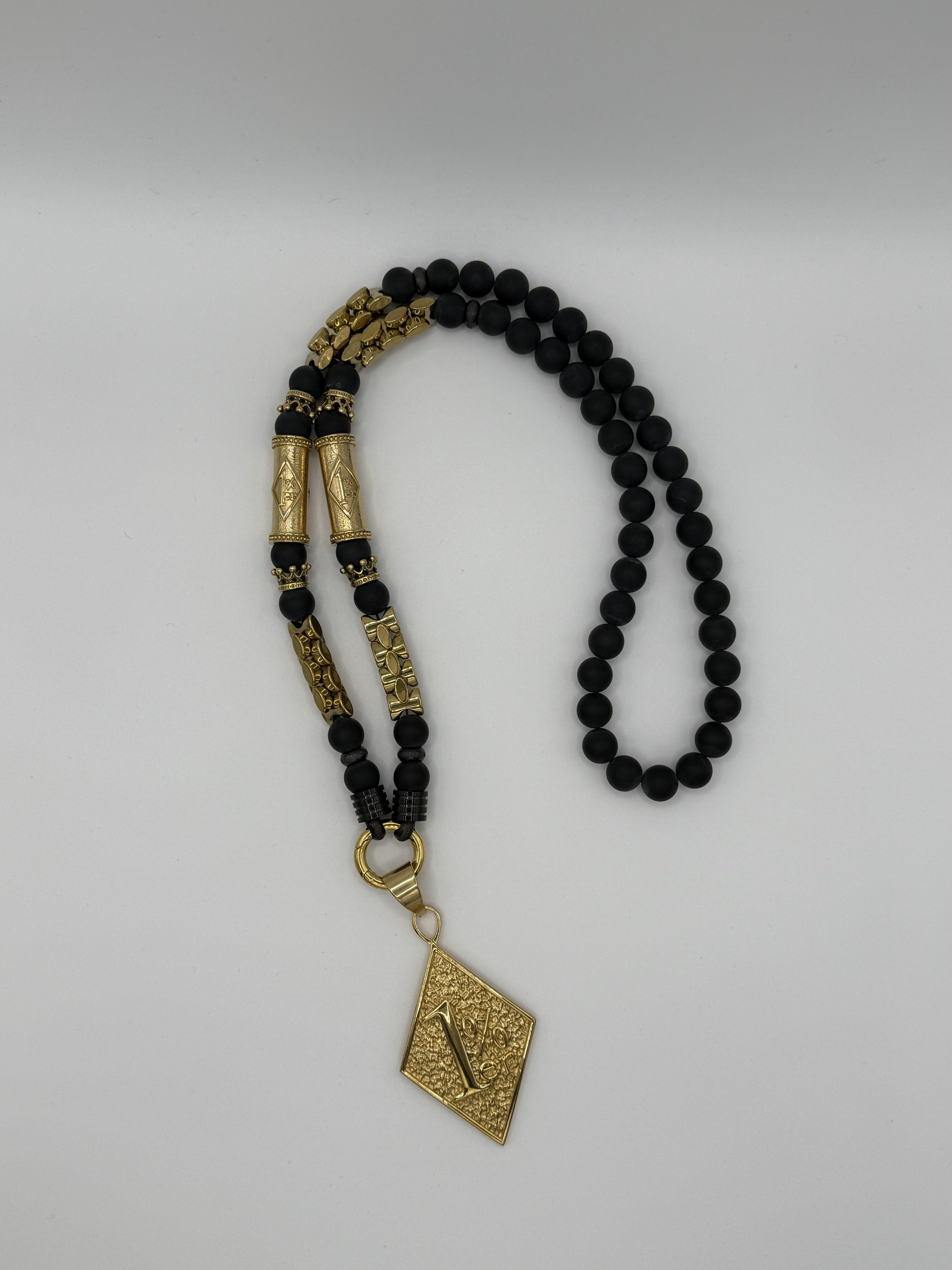Kette mit 1% Anhänger in gold
